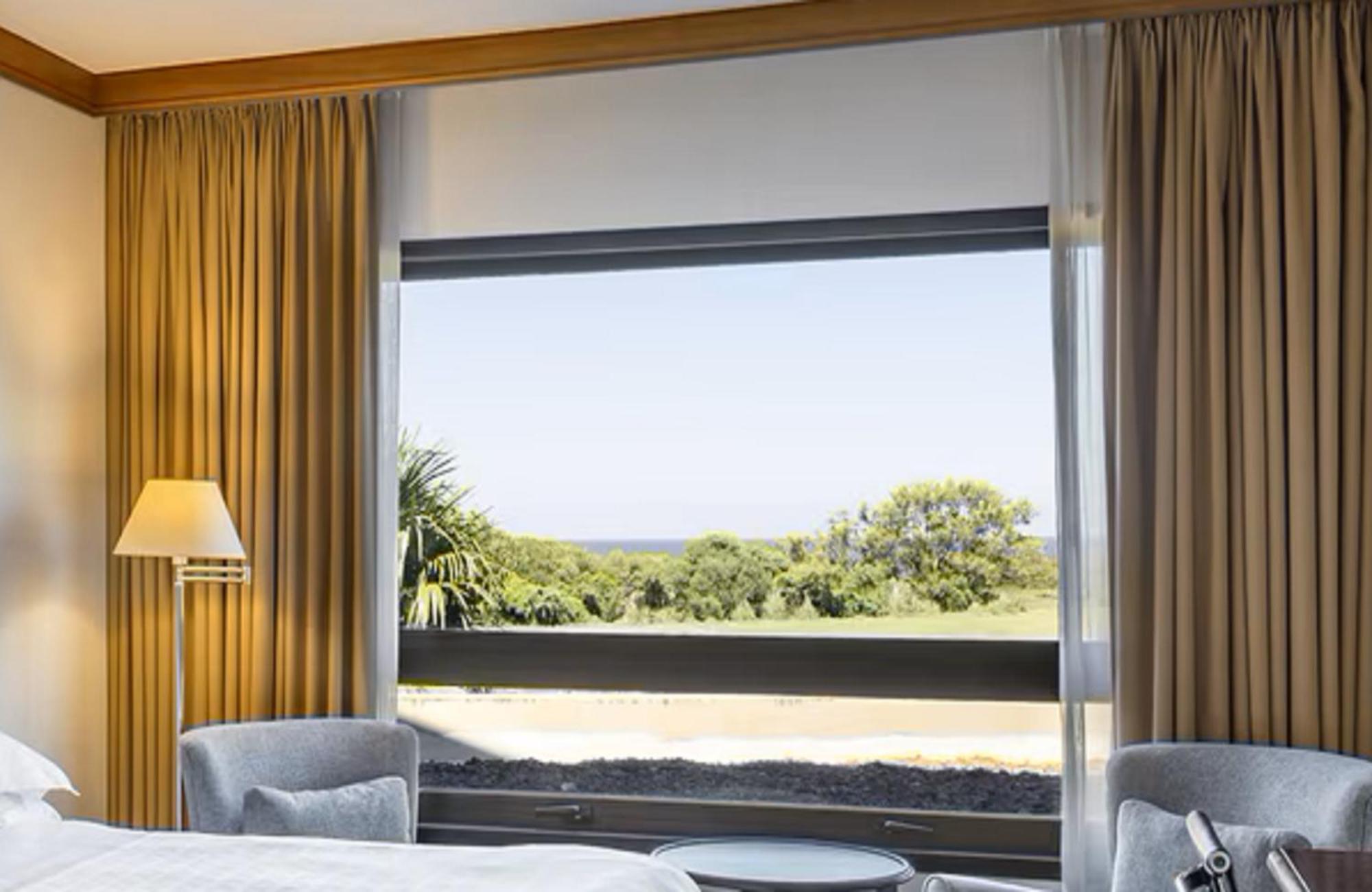 Quarto com 2 Camas Queen-size e Vista do Rio